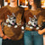 Alaskan Malamute Holding Daisy Unisex T-Shirt